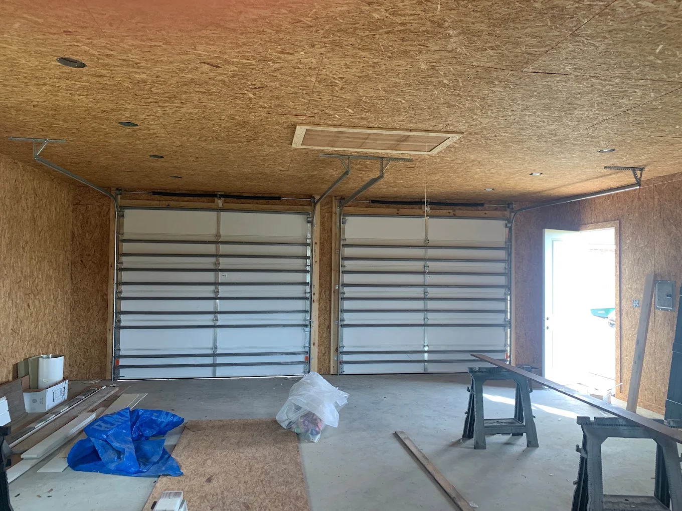 folding garage doors in pass christian - ace garage door